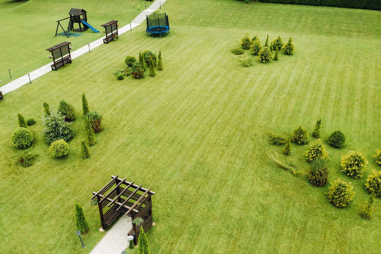 top view of a green lawn with seating areas and a 2023 11 27 04 56 11 utc.jpg